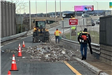 Cleaning litter from the Route 80 exit ramp.