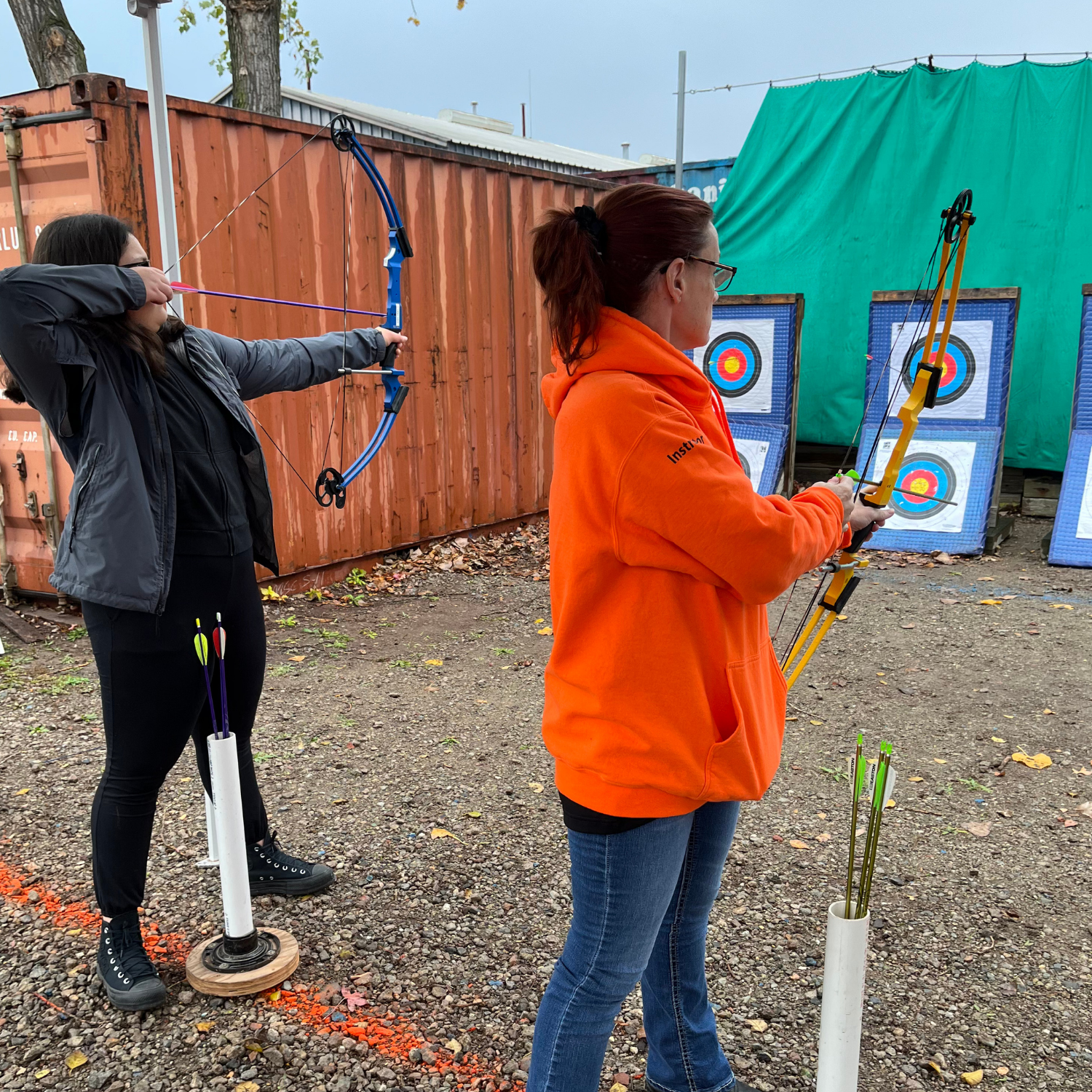 people at archery program