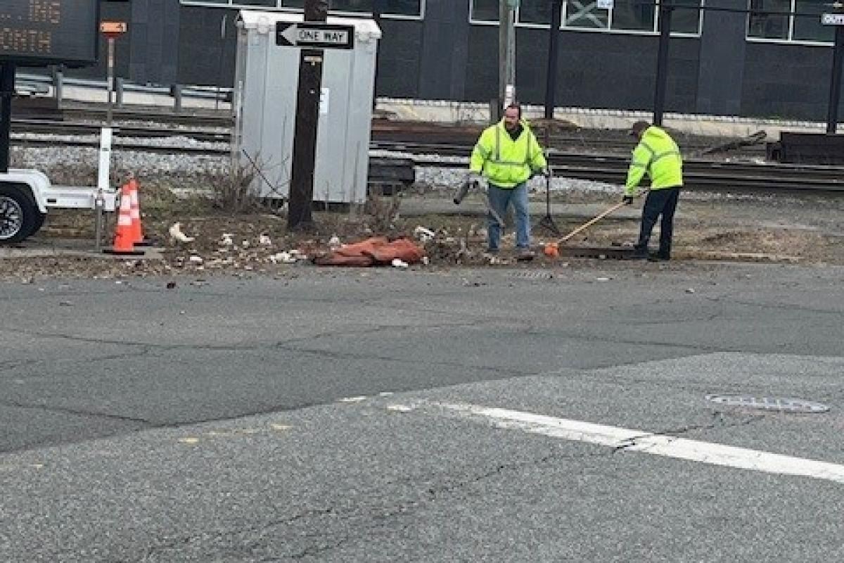 Cleaning the litter from the railroad tracks on Mt. Vernon Street.