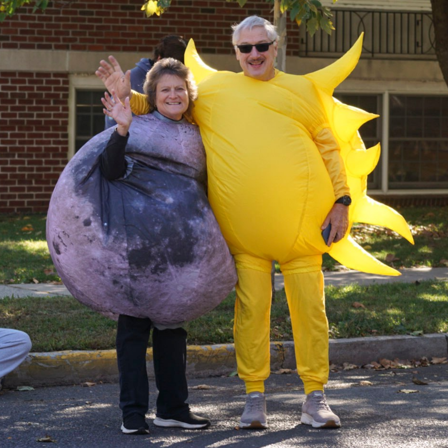bill gerken as wife dressed as sun and planet